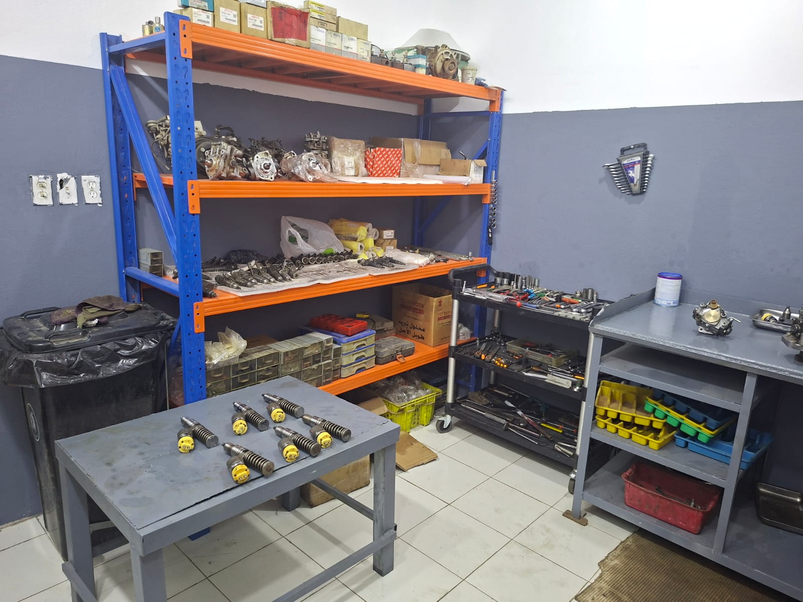 Engineers working on industrial generators in a modern facility